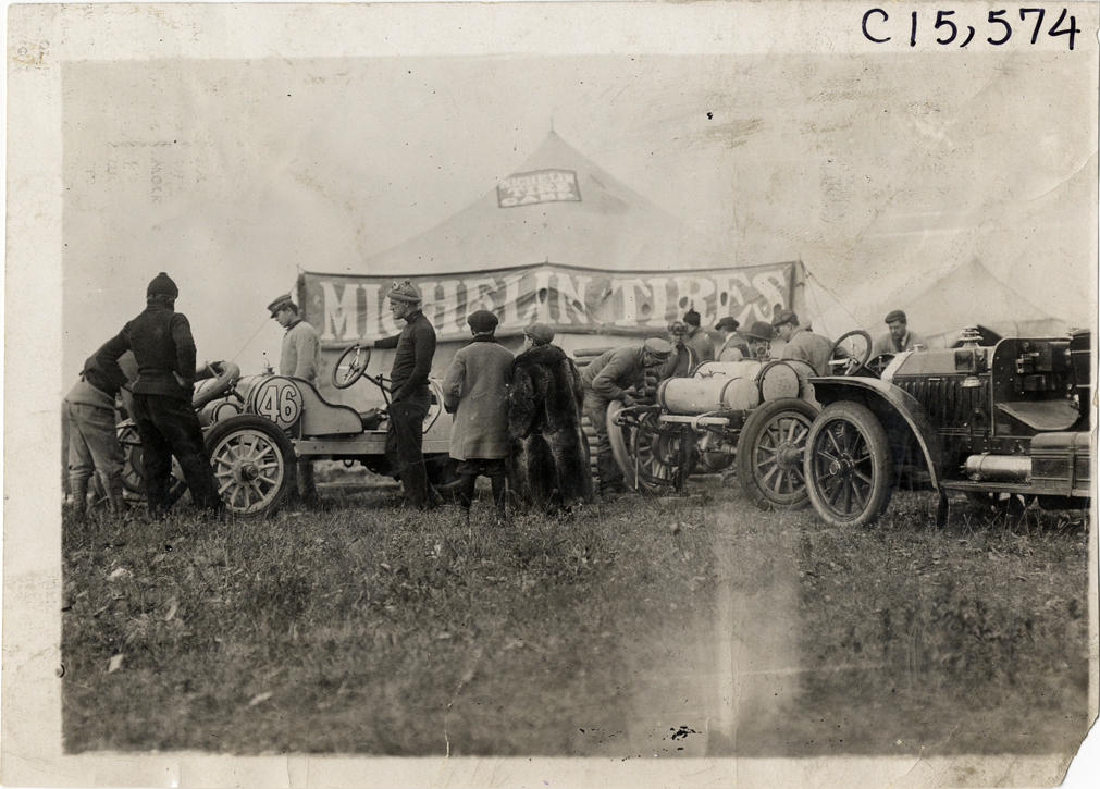 Crew and racecars at Michelin tires camp, 1909 Vanderbilt Cup races