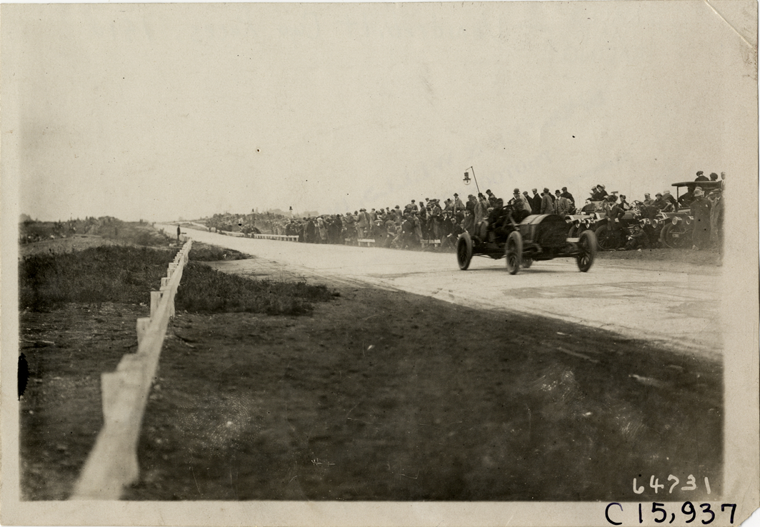 Driver and passenger in racecar, 1910 Vanderbilt Cup races