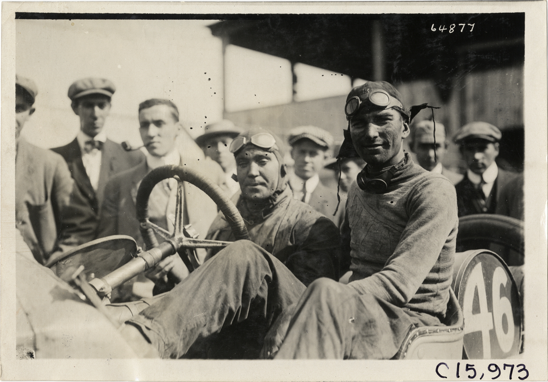 Driver and passenger in racecar, 1910 Vanderbilt Cup races