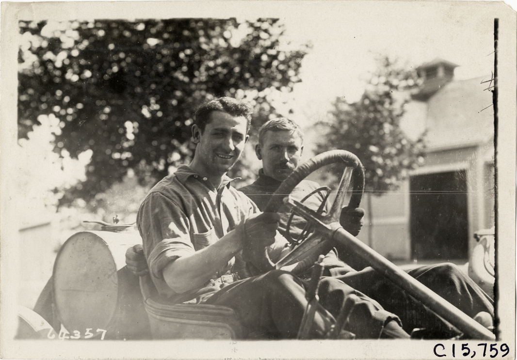 Driver and passenger in racecar, 1910 Vanderbilt Cup races