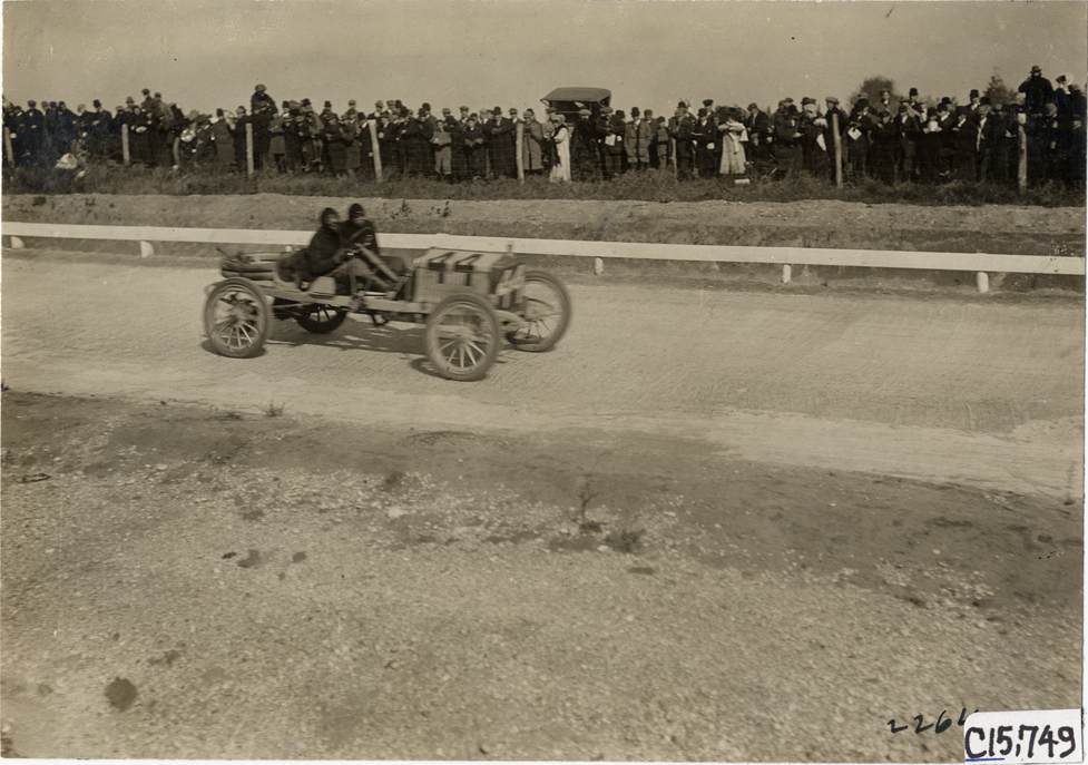 Driver and passenger in racecar, 1909 Vanderbilt Cup races