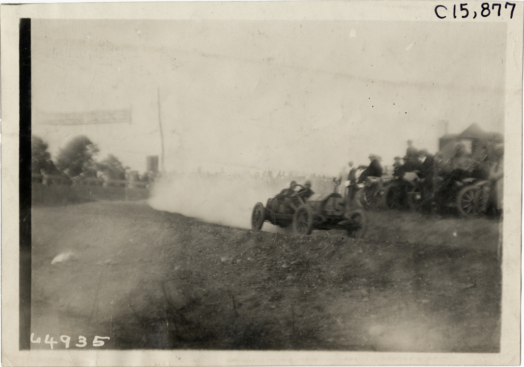 Driver and passenger in racecar, 1910 Vanderbilt Cup races