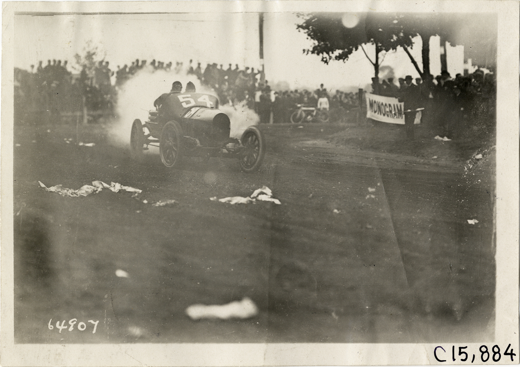 Driver and passenger in racecar, 1910 Vanderbilt Cup races