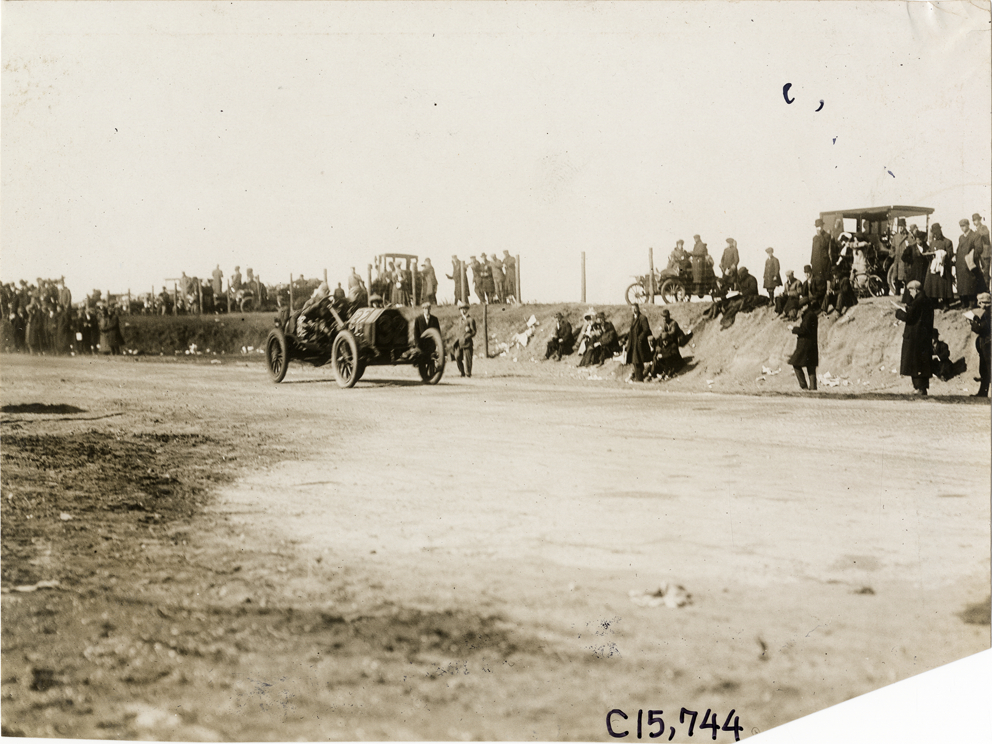 Driver and passenger in racecar, 1909 Vanderbilt Cup races