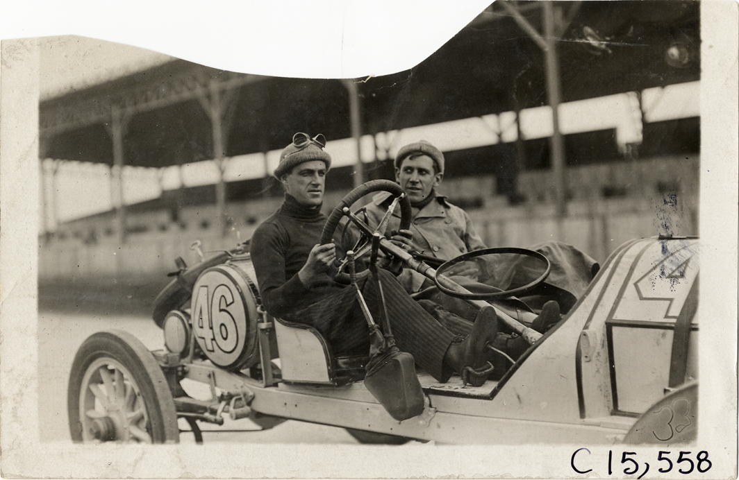 Driver and passenger in racecar, 1909 Vanderbilt Cup races