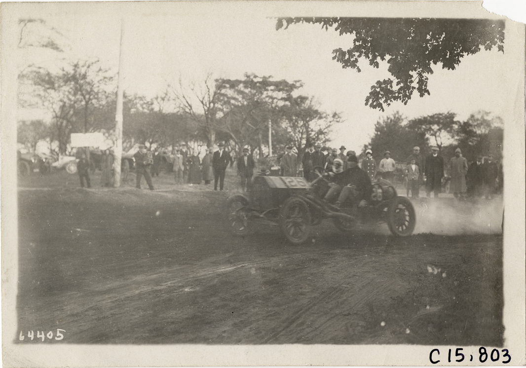Driver and passenger in racecar, 1910 Vanderbilt Cup races