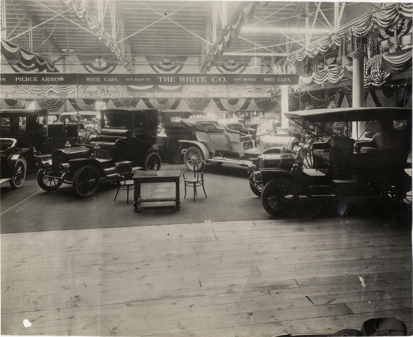 White automobiles on exhibit, 1909 Newark Auto Show