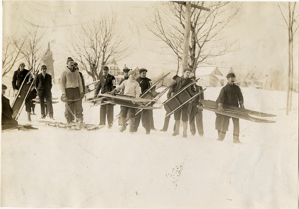 Men carrying sleds, Huntington, Long Island