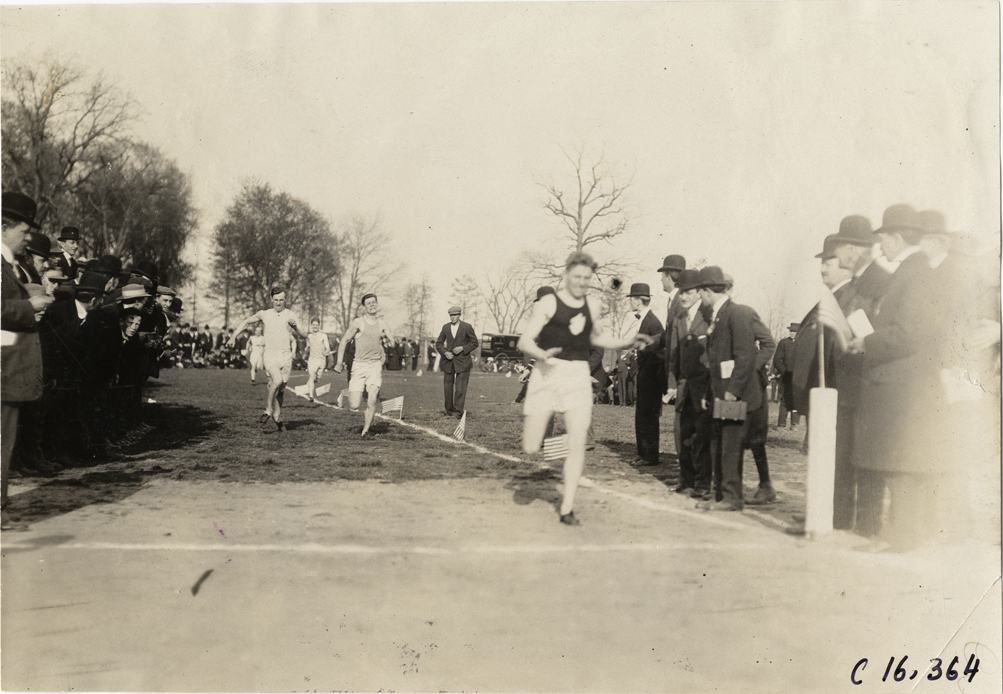 Runners crossing finish line