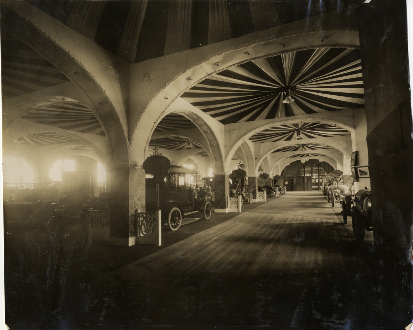 Aisle in exhibit area, 1909 Boston Auto Show