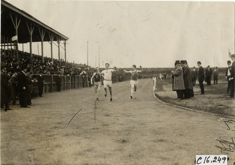 Runners competing in race at track and field event during the 1909 New Jersey Marathon