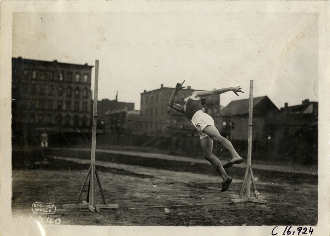 J. Georgopoulos competing in high jump