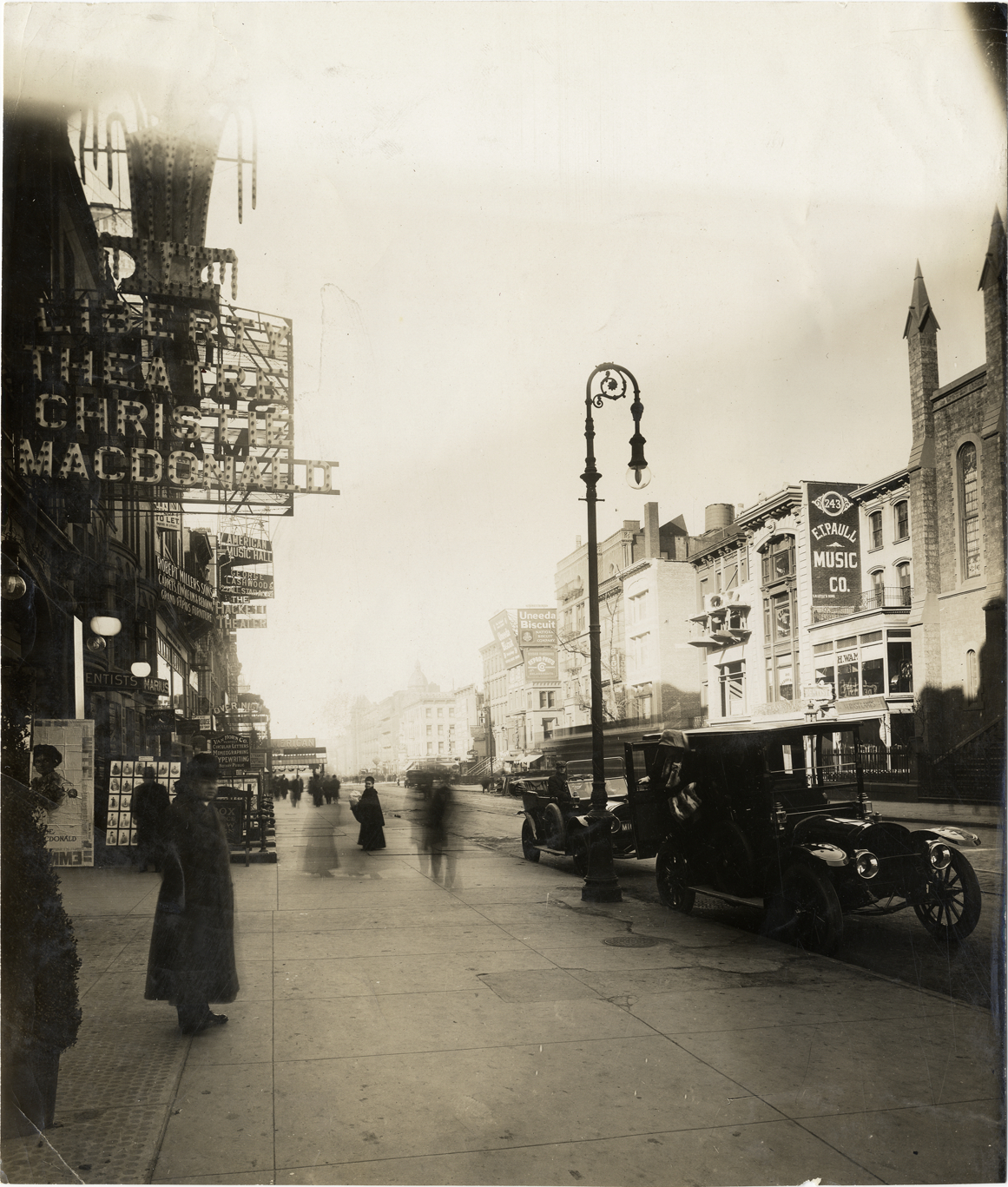 Men and women in front of Liberty Theatre, New York