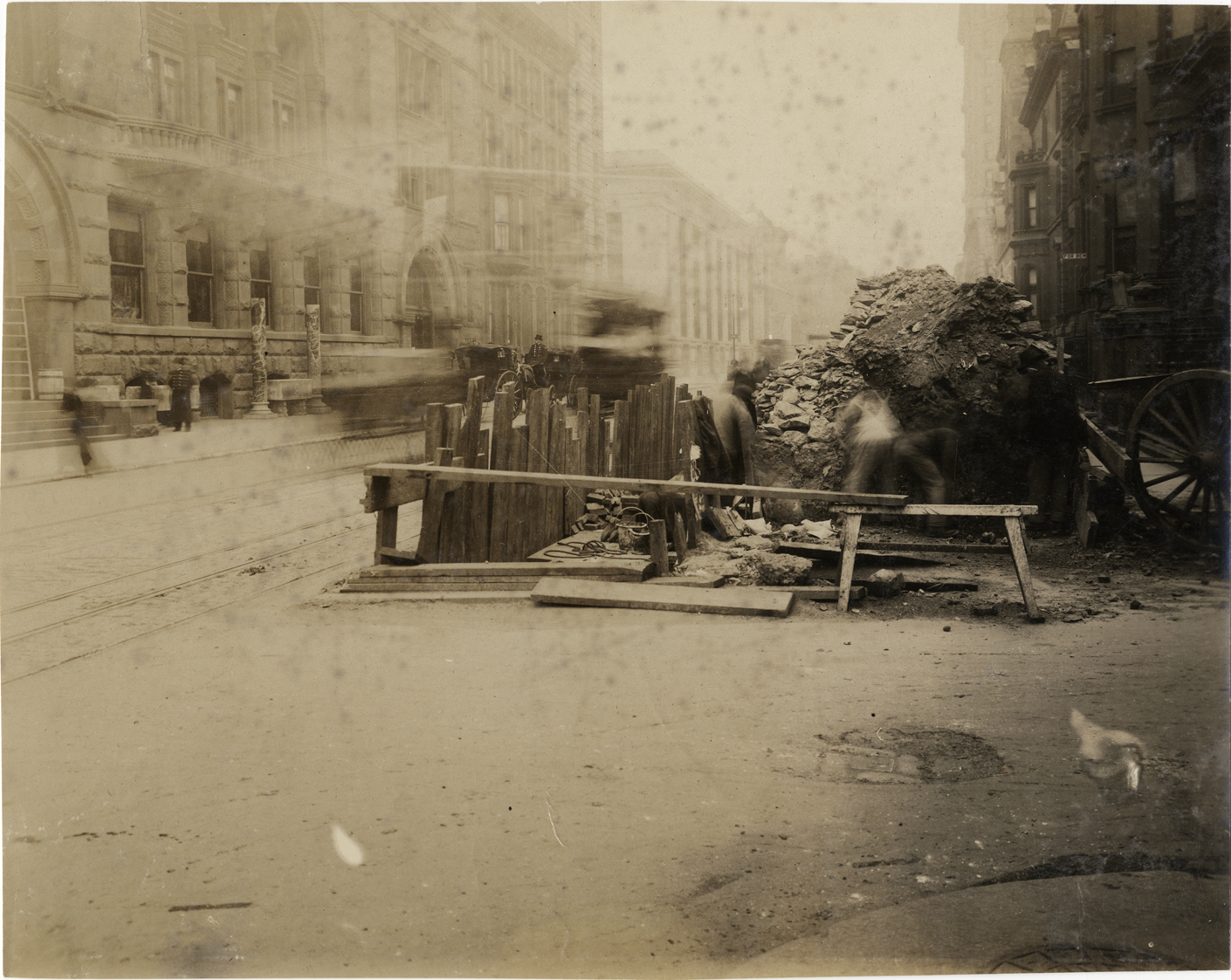 Workers in construction area on street, New York