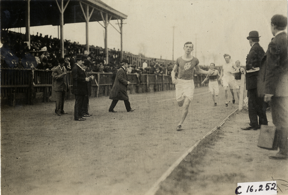 Runners competing in race at track and field event during the 1909 New Jersey Marathon