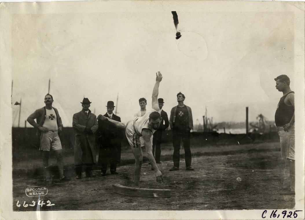 Theodore L. Matsukes competing in hammer throw