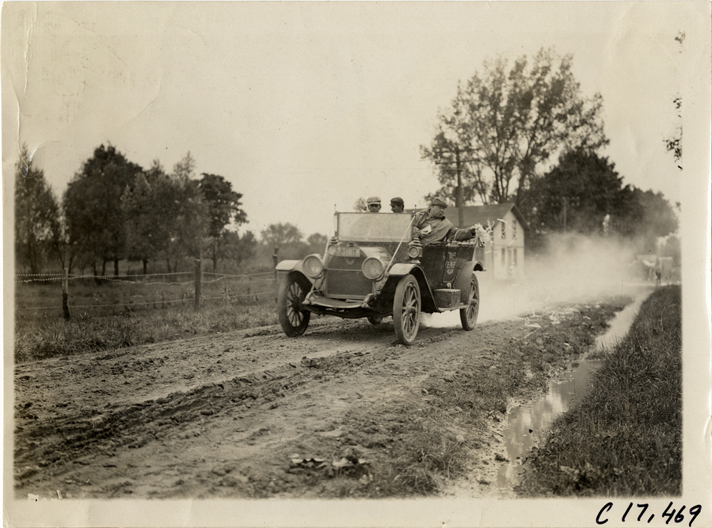 Motorists in E-M-F pilot automobile, 1911 Buffalo Reliability Run