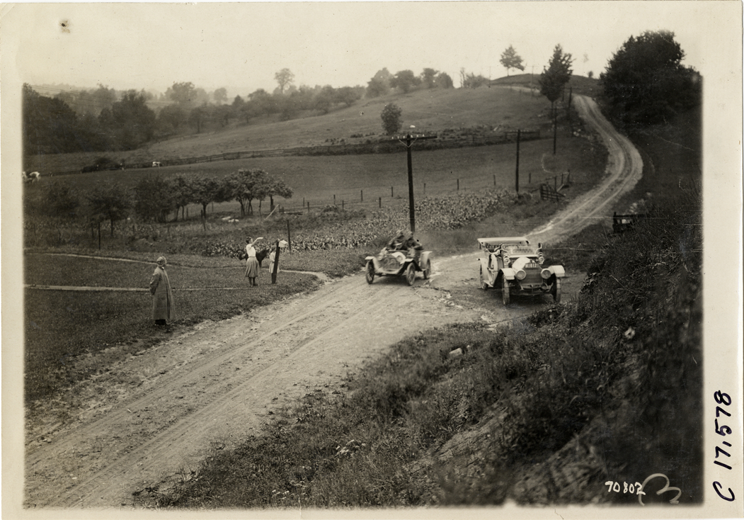 Automobiles on rural road, 1911 Buffalo Reliability Run