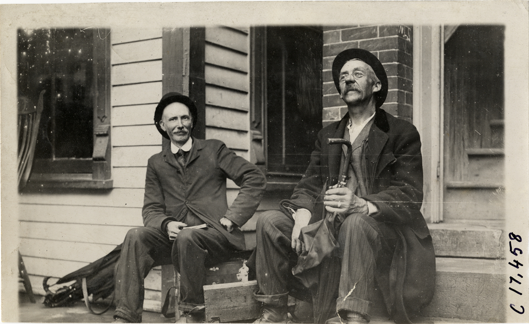 Men sitting on porch, 1911 Buffalo Reliability Run
