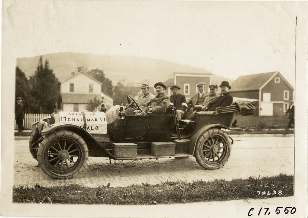 Motorists posing in automobile, 1911 Buffalo Reliability Run