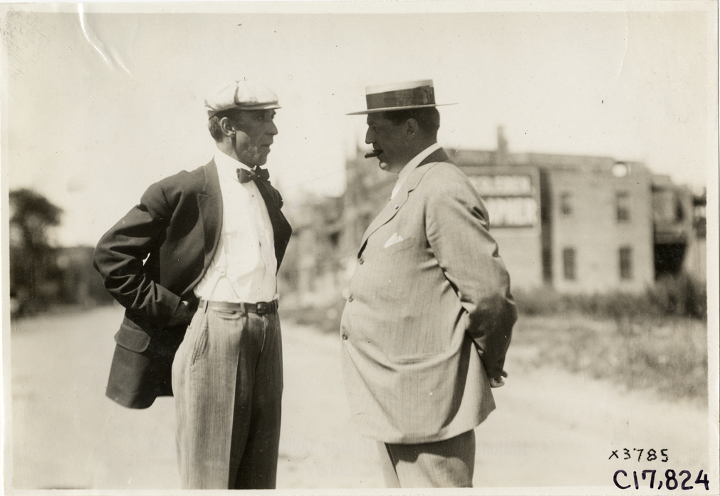 Two men conversing, 1911 Chicago Reliability Run