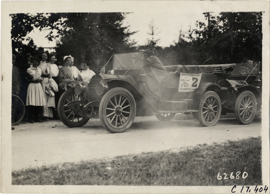 Driver and passenger in automobile, 1910 Brooklyn Dealers Reliability Run