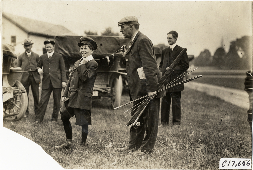 William J. "Senator" Morgan holding fishing rods, 1909 Catskill-Berkshire Tour