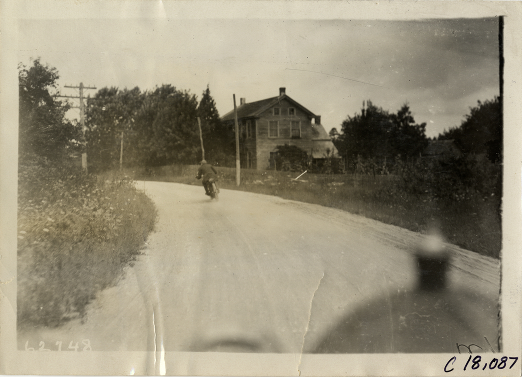 Man riding motorcycle, 1910 Federation of American Motorcyclists Endurance Run