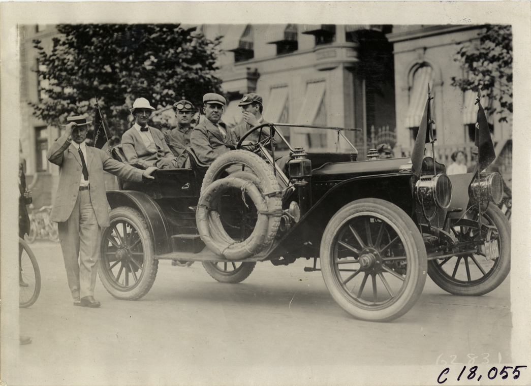 Officials in automobile, 1910 Federation of American Motorcyclists Endurance Run