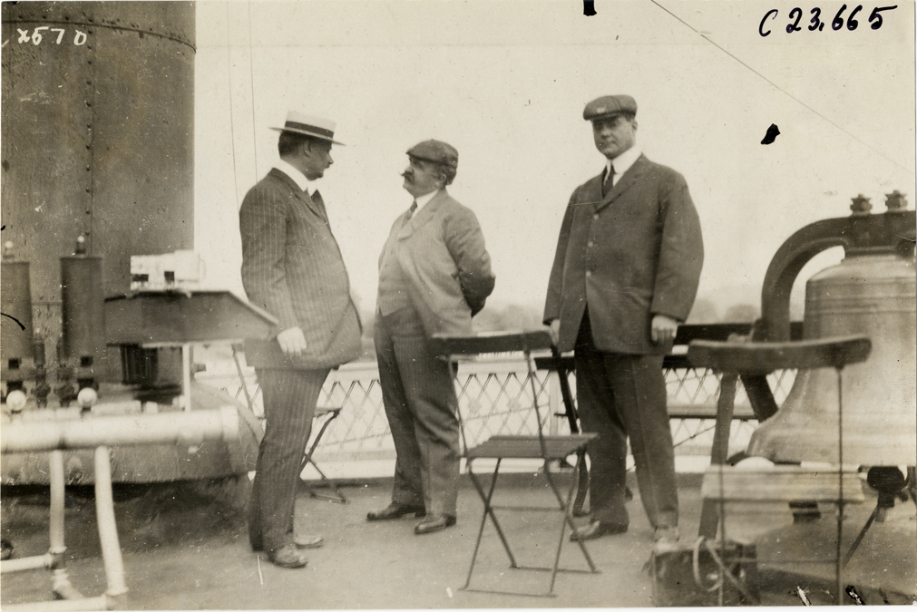 Men on deck of steamboat, 1910 Glidden Tour
