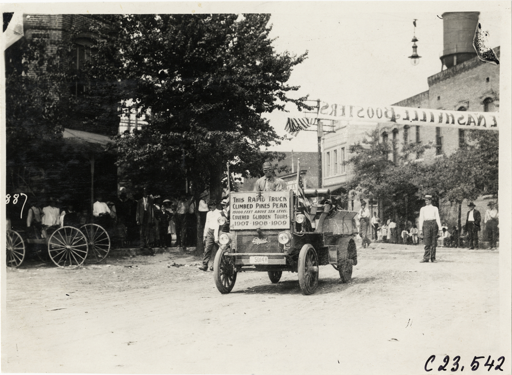 Motorist posing in Rapid truck, 1910 Glidden Tour