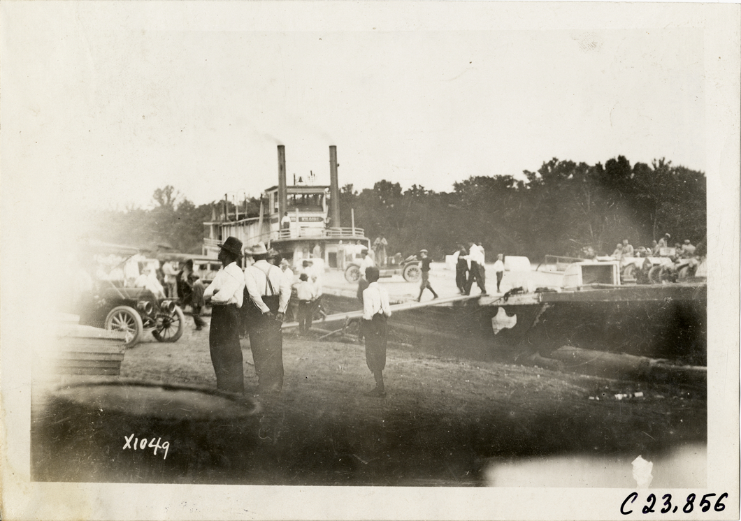 Automobiles on barge, 1910 Glidden Tour