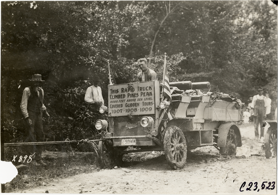 Rapid truck being towed out of muddy road, 1910 Glidden Tour