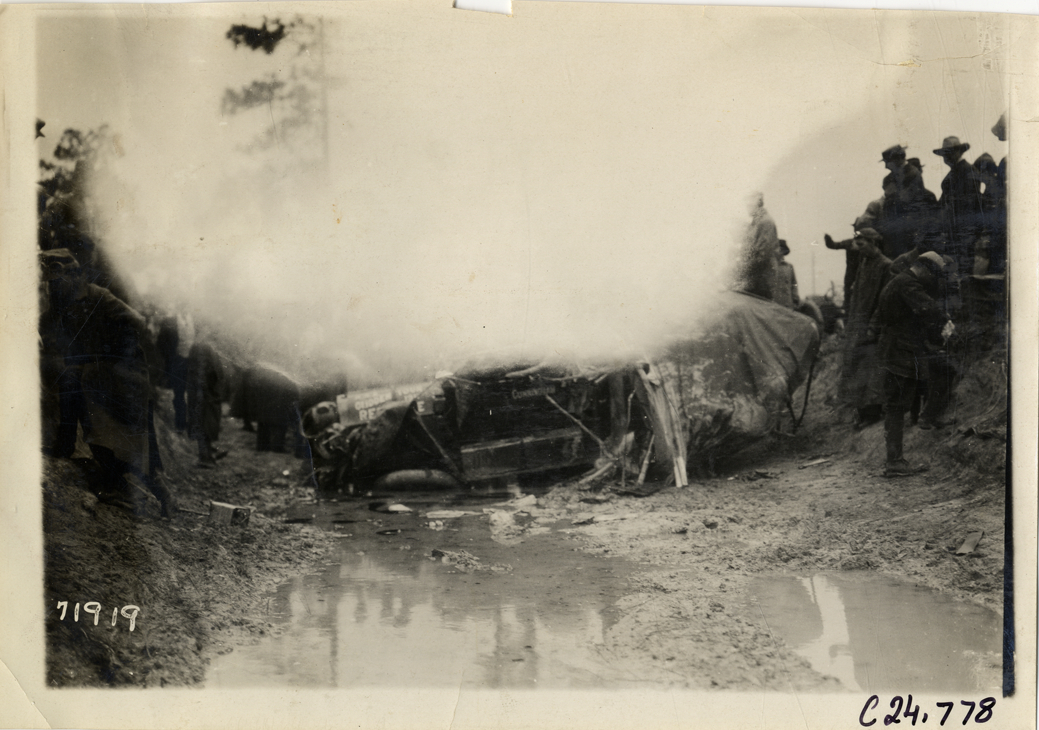 Damaged Cunningham automobile in ditch, 1911 Glidden Tour