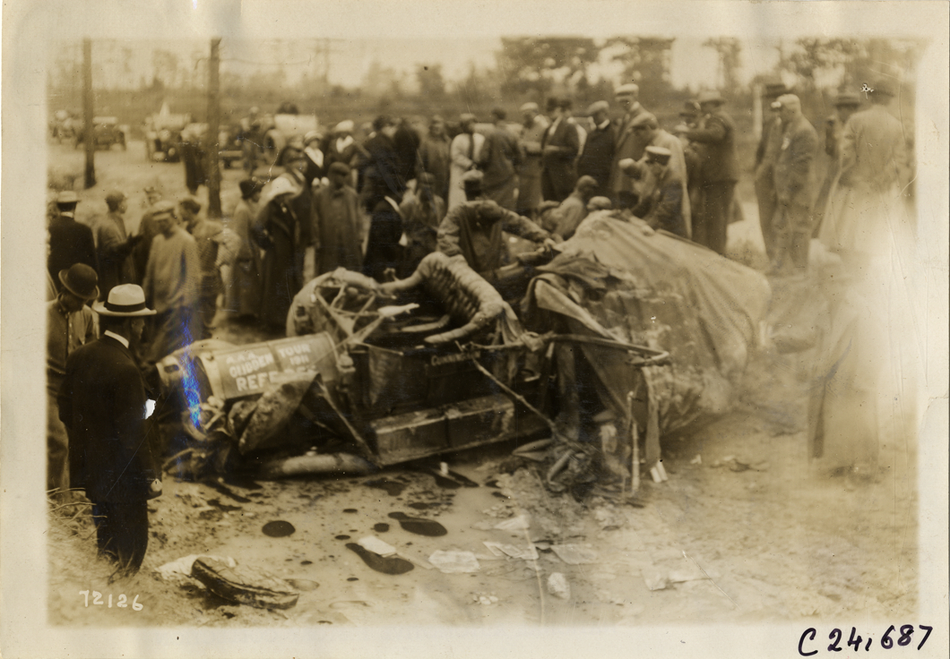 Damaged Cunningham automobile in ditch, 1911 Glidden Tour