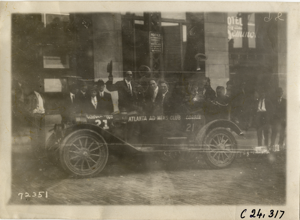 Motorists posing in Corbin automobile, 1911 Glidden Tour