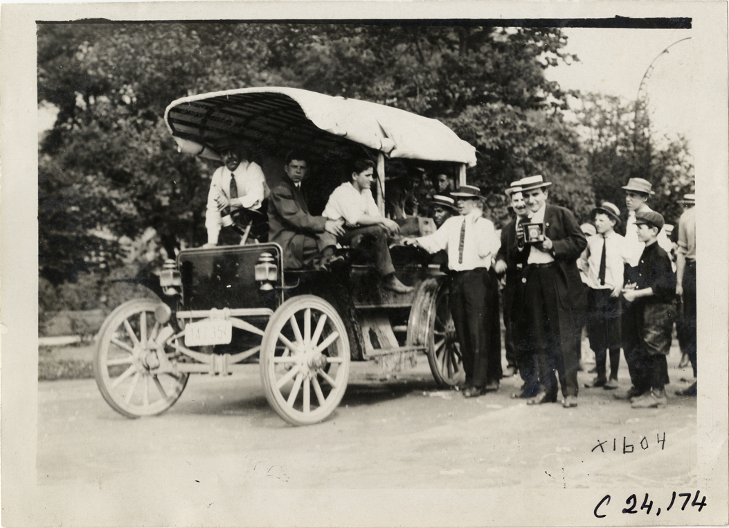 Motorists posing in truck, 1910 Glidden Tour