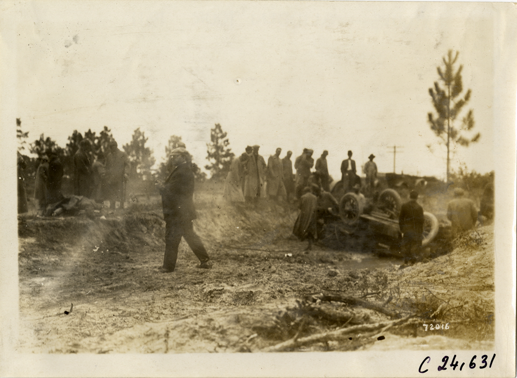 Damaged Cunningham automobile in ditch, 1911 Glidden Tour