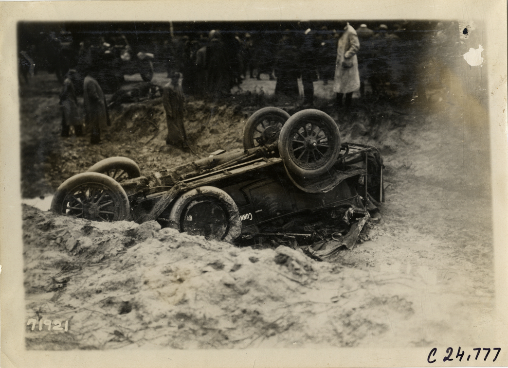 Damaged Cunningham automobile in ditch, 1911 Glidden Tour