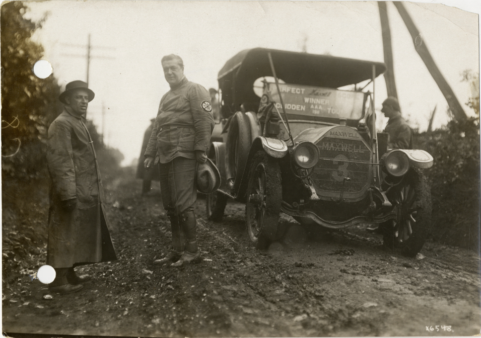 Motorists posing with Maxwell car on rural road, Tennessee, 1912 Glidden Tour