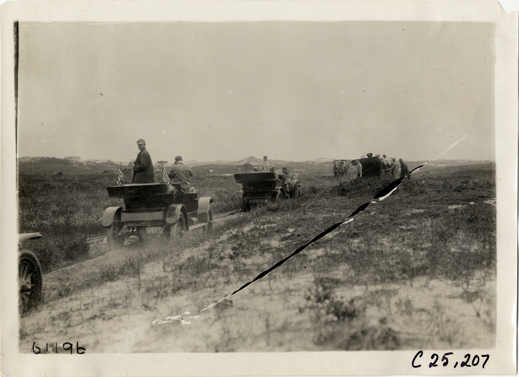 Automobiles traveling on road to Montauk Point lighthouse, 1910 Montauk Point Reliability Run