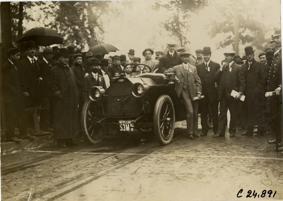 Officials and spectators posing with automobile, 1909 Hackettstown Endurance Run