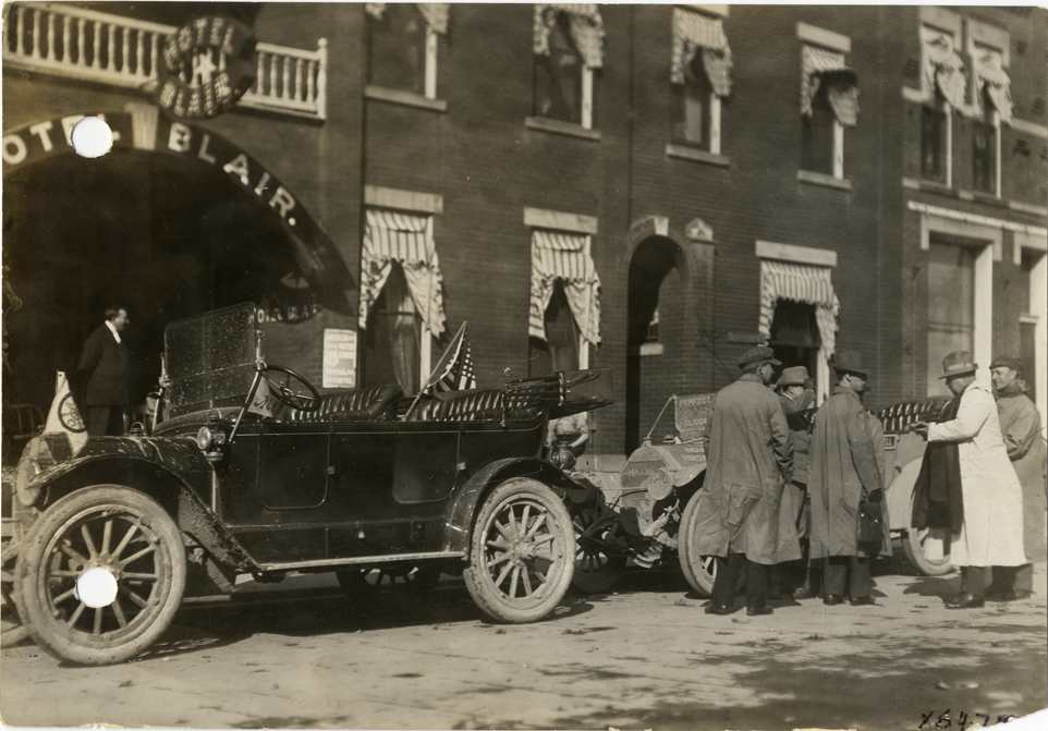 Motorists with automobiles in front of Hotel Blair, Wauseon, Ohio, 1912 Glidden Tour