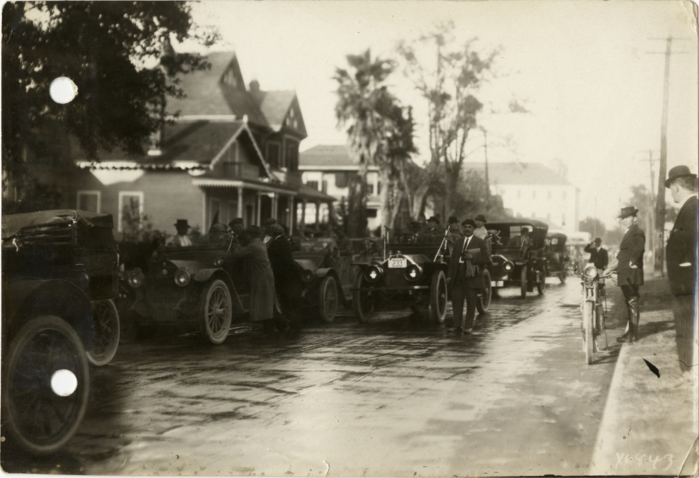 Automobiles lined up in street at New Orleans, Louisiana, 1912 Glidden Tour