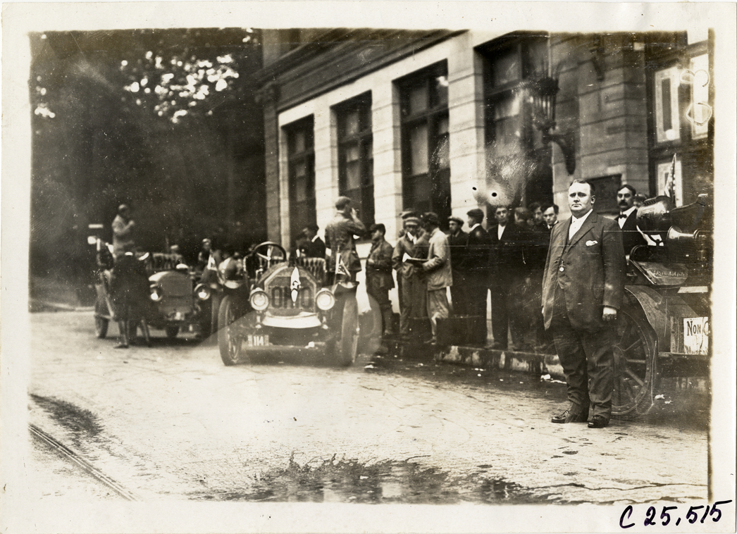 Automobiles and Randolph truck lined up in street, 1910 Munsey Historic Tour