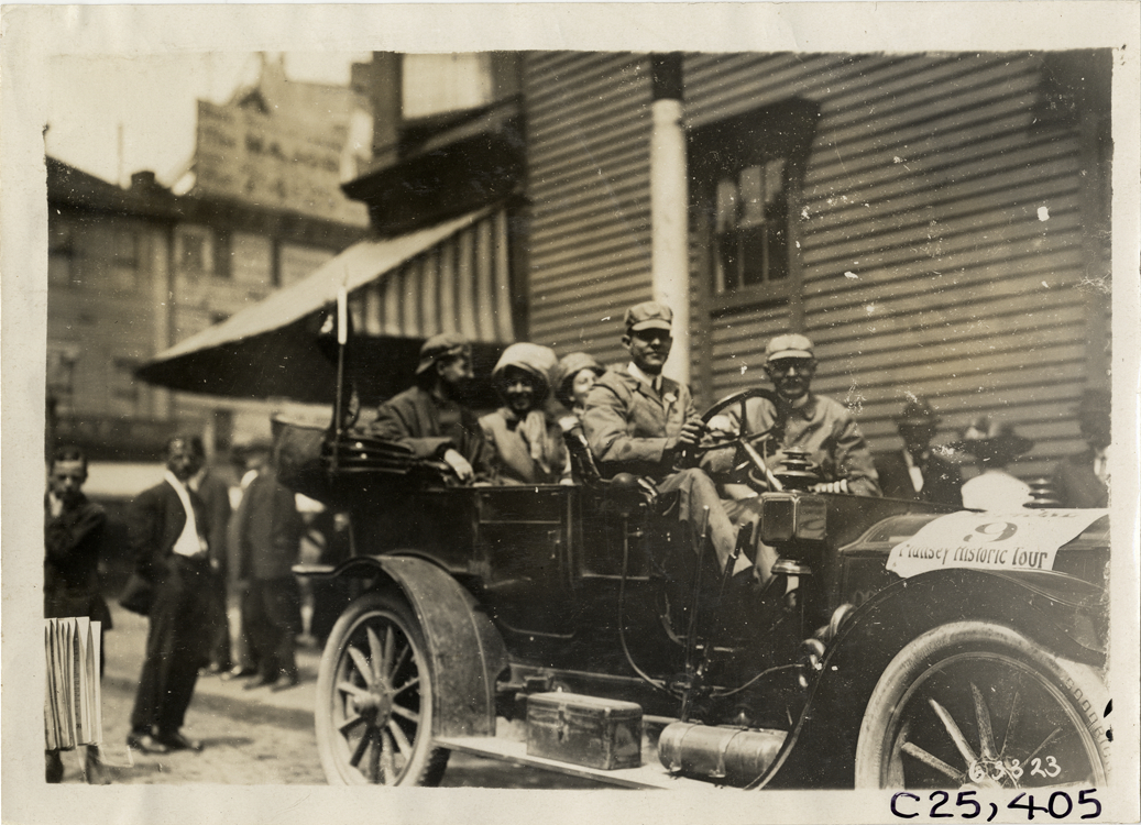 Motorists posing in Elmore automobile, 1910 Munsey Historic Tour