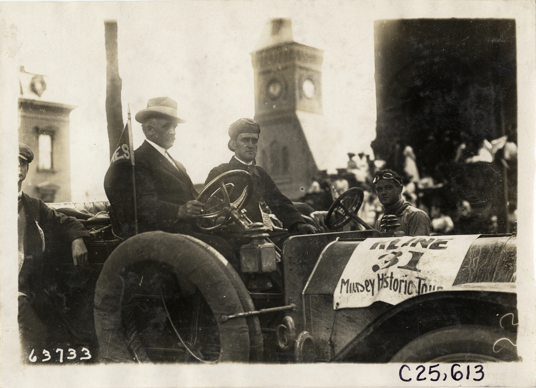 Driver and passenger in Kline automobile, 1910 Munsey Historic Tour
