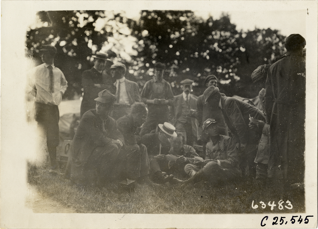 Motorists relaxing on lawn, 1910 Munsey Historic Tour