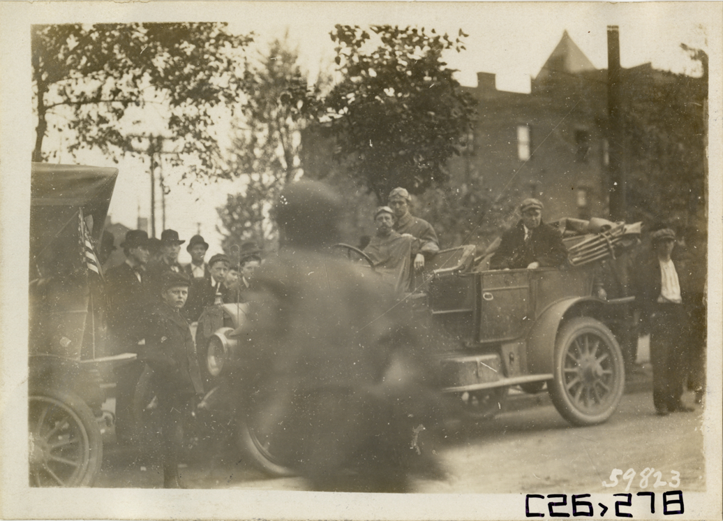 Motorists posing in automobile, 1910 New Jersey Reliability Run
