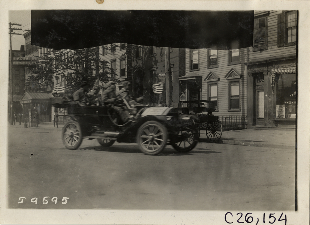 Motorists traveling in Pierce-Racine automobile, 1910 New Jersey Reliability Run